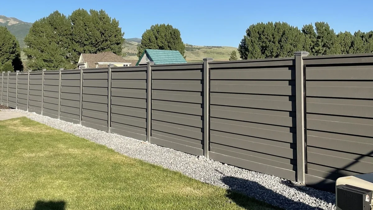 Trex Solitudes horizontal composite privacy fence in Winchester Grey